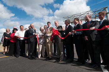 Gov. Perry cutting the ribbon for the opening of sections 5-6 of SH 130 on Oct. 24, 2012..