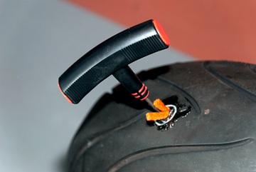 Figure 2 When using string plugs, make sure you apply sufficient rubber cement before pushing it into the tire.