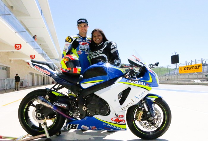Chris Ulrich and Jeida Mitchell in front of the Suzuki GSXR 1000 at Circuit of The Americas. (Photo Credit: Darice Chavira)